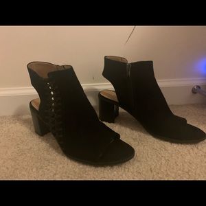 Black chunky open toe and heal boots.